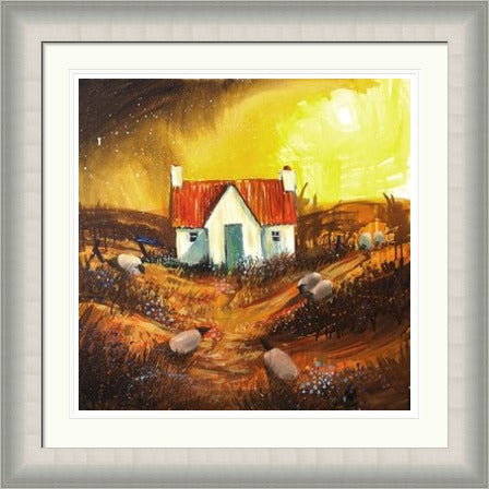 A Storm Breaking by Ann Vastano framed wall art print showing a white cottage with a red roof beneath a glowing yellow storm sky