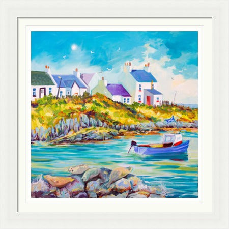 Basking Seals by Ann Vastano framed wall art print showing seals resting on rocks beside turquoise water, a small boat and white coastal cottages