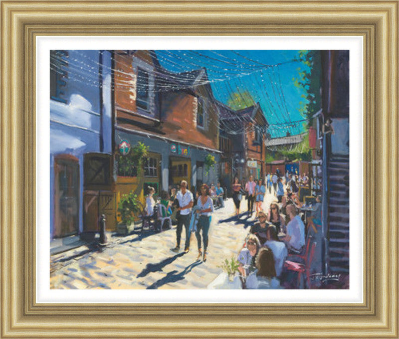 Summer on Ashton Lane by James Somerville Lindsay framed wall art print showing Ashton Lane in Glasgow during summer, with the much-loved West End lane given a bright, inviting feel