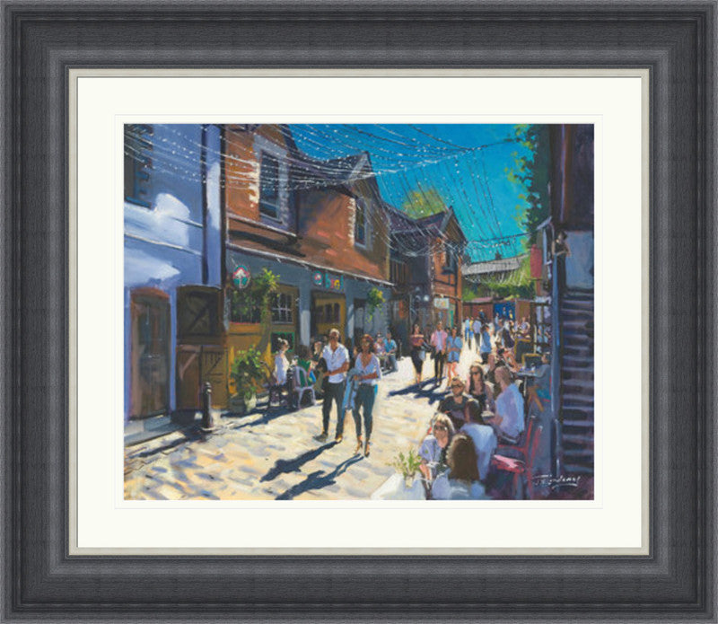 Summer on Ashton Lane by James Somerville Lindsay framed wall art print showing Ashton Lane in Glasgow during summer, with the much-loved West End lane given a bright, inviting feel