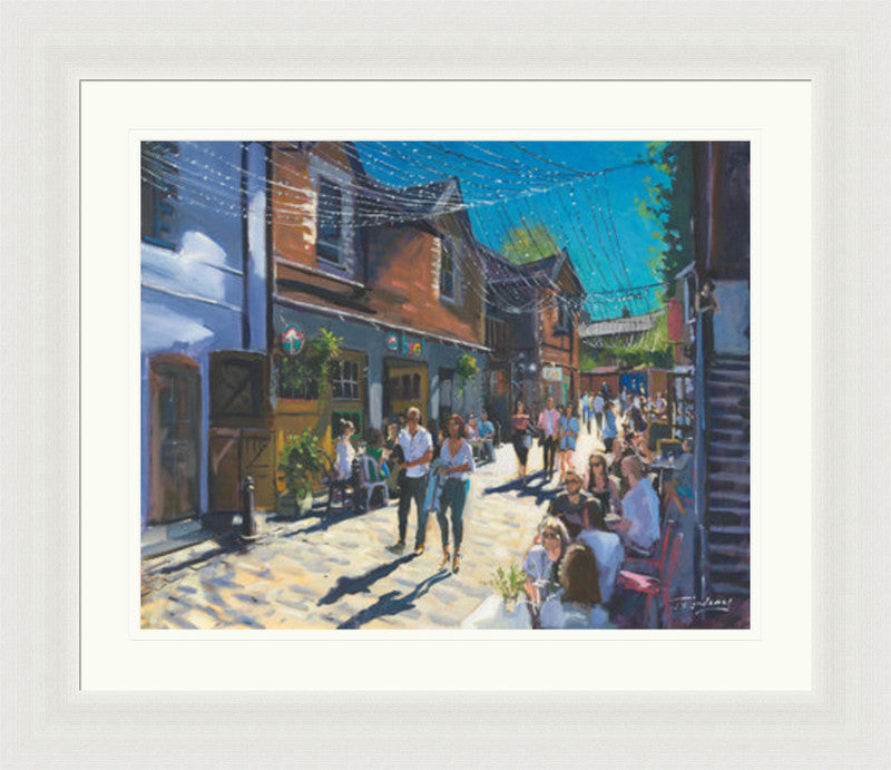 Summer on Ashton Lane by James Somerville Lindsay framed wall art print showing Ashton Lane in Glasgow during summer, with the much-loved West End lane given a bright, inviting feel
