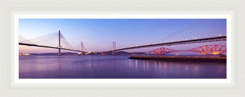 Three Bridges Purple by Ian Marshall framed wall art print showing the three Forth bridges in a purple toned panoramic scene