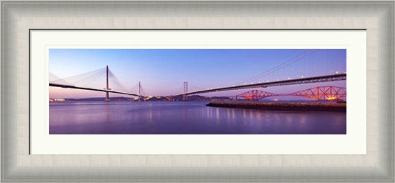 Three Bridges Purple by Ian Marshall framed wall art print showing the three Forth bridges in a purple toned panoramic scene